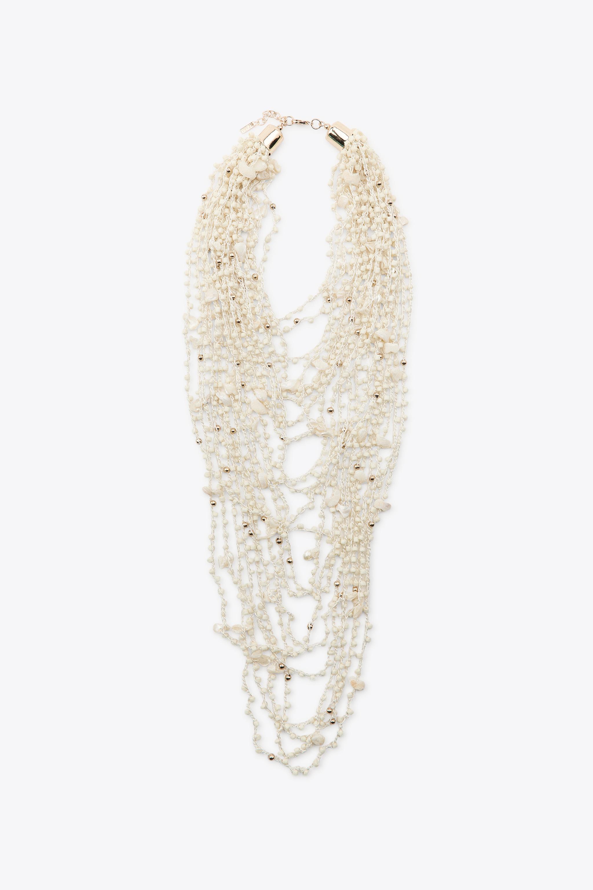 BEADED SHELL BIB NECKLACE